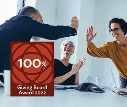100 percent Giving Board Award teamwork photo 2022